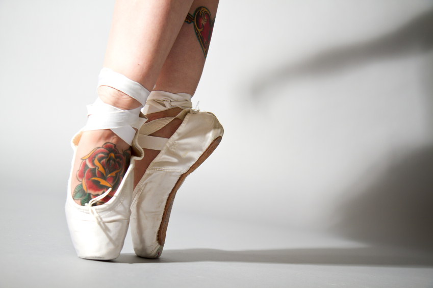 Tattooed feet in ballet shoes iStock_000019146674_Small_3