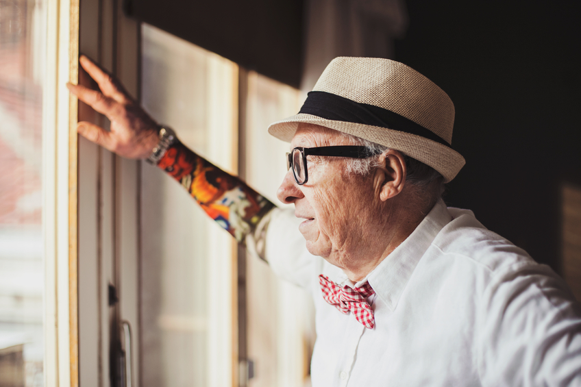 Serious_senior_man_with_tattoo__tattoo_sleeve_iStock_57115742_SMALL